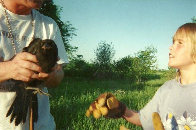 dad handing Elizabeth the crow | Art Therapy with Kimberly